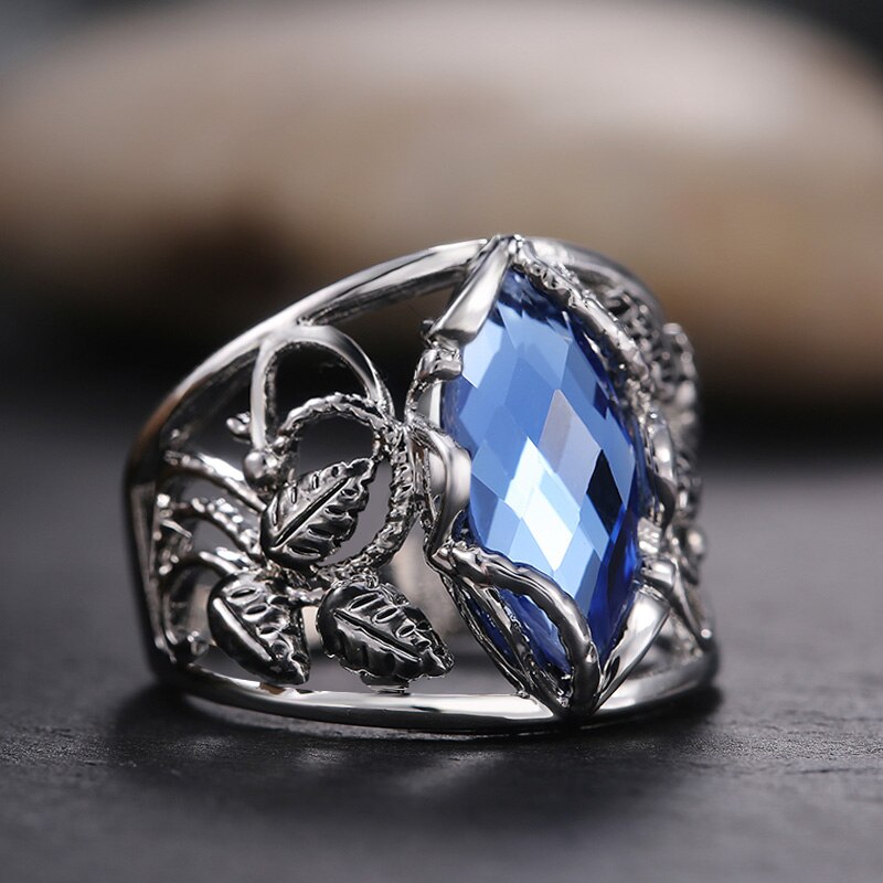 Huitan Singolo grande blu cavallo occhio Trapano Mosaico Anello di Barretta per Le Donne vuoto Foglie Modello Intorno Al Iperbole di Cerimonia Nuziale Anello punk SKU: 10