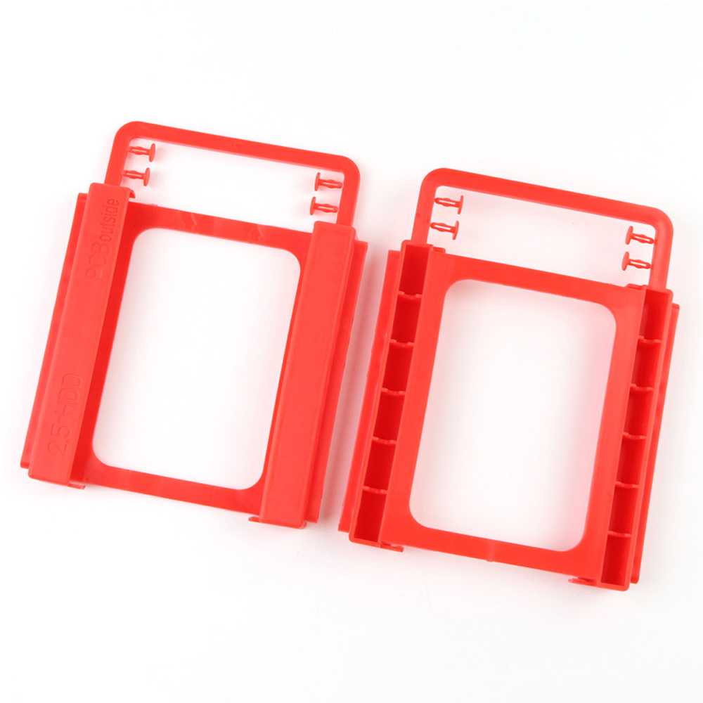 2.5 To 3.5 In SSD HDD Mounting Plastic Adapter Bracket with 4 plugs as a screw.