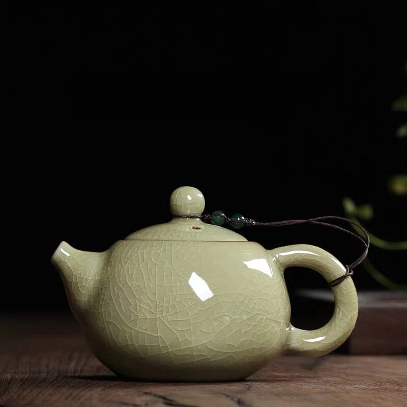 Juego de té con esmalte craquelado, tetera china de cerámica celadón longquan con horno ge, tetera antigua de arcilla yixing.: Gramo