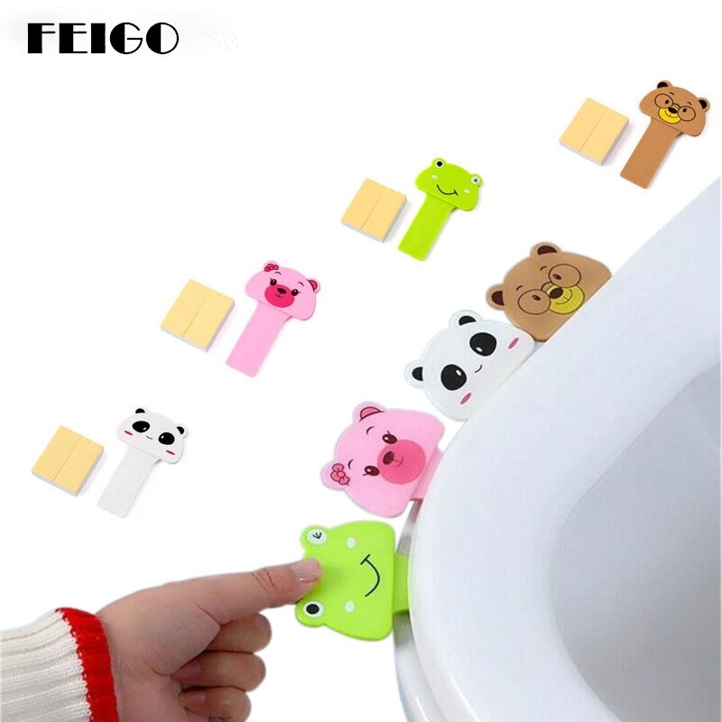 FEIGO, 2 piezas, nueva, bonita funda de dibujos animados, dispositivo de elevación, tapa de baño, inodoro, manija portátil, accesorios para Asiento de baño, inodoro, F104