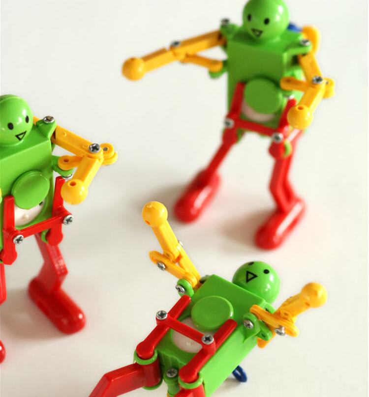 Så samle 1 stk urværk spring wind up dansende robot legetøj børn børn