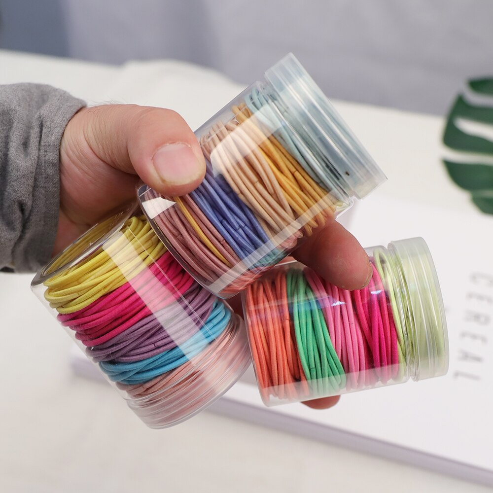 Gomas elásticas de goma para el pelo para niñas y mujeres, gomas finas de colores de 2MM de grosor, accesorios básicos para el cabello, goma bonita para el pelo, botella de 4CM, 100 Uds.