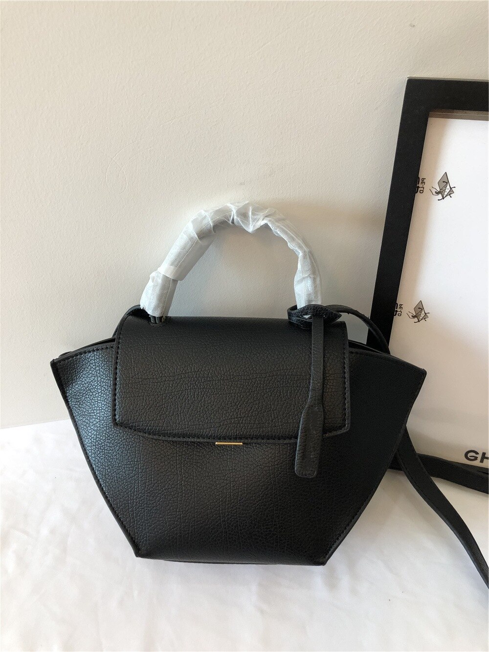 SOUTHLAND Hand held flap wing bag medium single sh... – Grandado