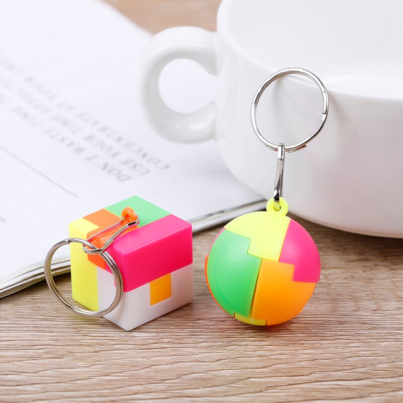Porte-clés magique Cube autocollant moins torsion puzzle Cube jouet Smart porte-clés sac décoration mignon