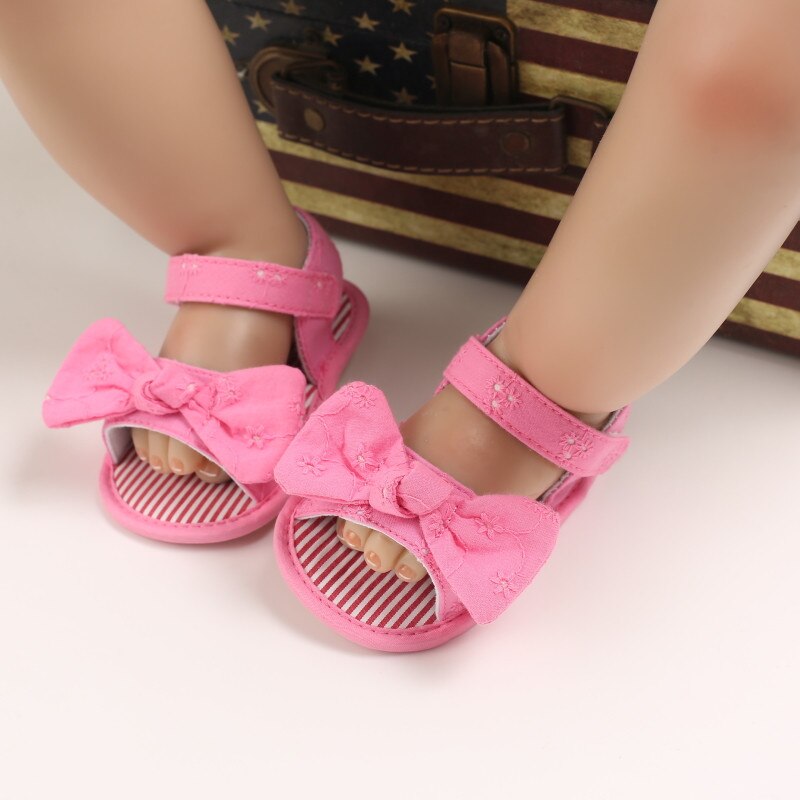 Sandali per bambina estivi traspiranti, decorazioni con fiocco stile dolce per bambini scarpe con suola morbida Prewalker antiscivolo per neonati