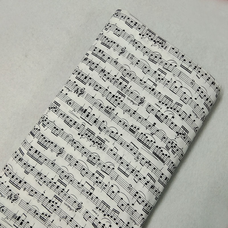 Clásico blanco negro música nota Musical estampado con de notas tela de algodón 50x105cm para DIY de coser bolsa de tela de la decoración del hogar
