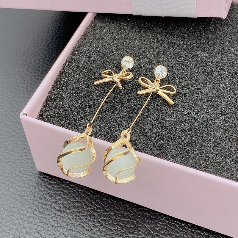 Trendy oorbellen met metalen frame en hangende opalen voor dames, gouden strass-steentjes, strikjes, lange sieraden voor bruiloften en feestjes.: Default Title
