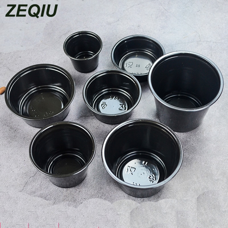 Black disposable sauce cup with lid Salad Ketchup container Snack bar takeaway supermarket tasting essential.