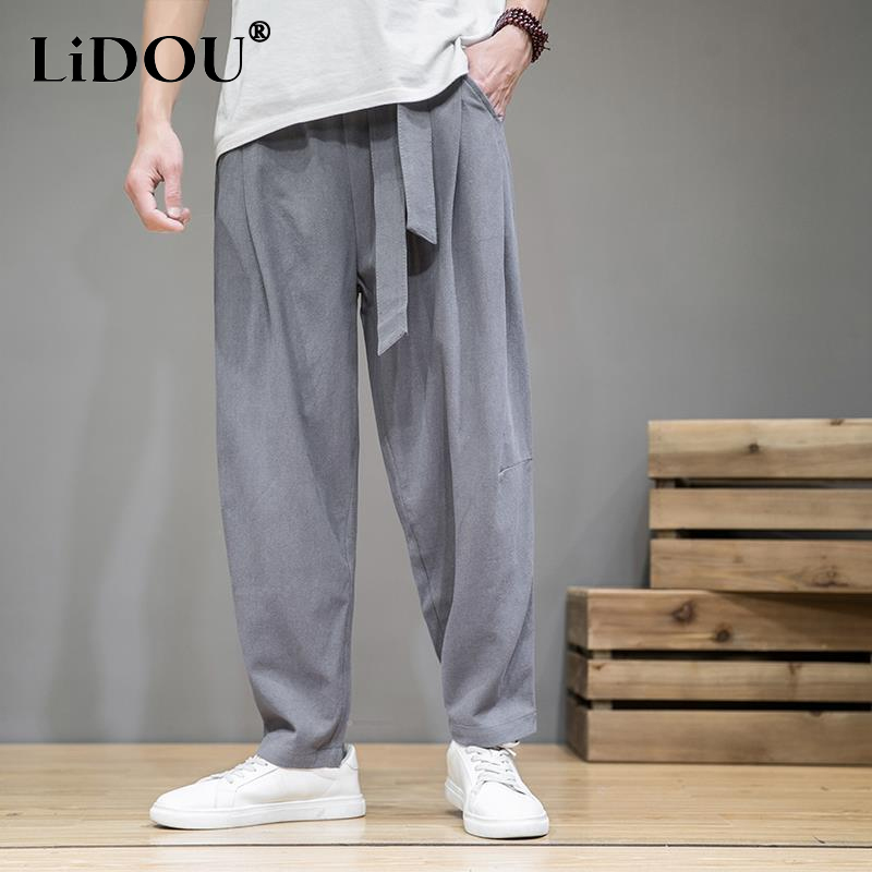 Pantalones rectos de Color sólido de estilo chino para primavera y verano, pantalones Haren cómodos con cintura elástica y bolsillos Vintage de algodón y cáñamo