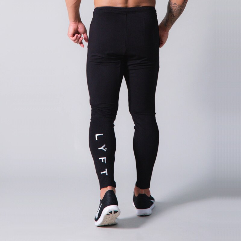 Pants men's jogging fitness track pants men's Korean casual slim hit color jogging trousers: XXXL / Black
