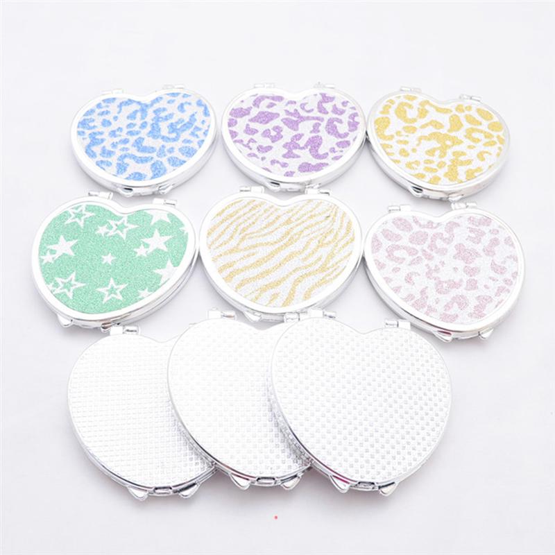 Mini poche en forme de coeur maquillage miroir cosmétique Compact miroirs Portable Double côtés maquillage miroir pour les femmes (couleur aléatoire)