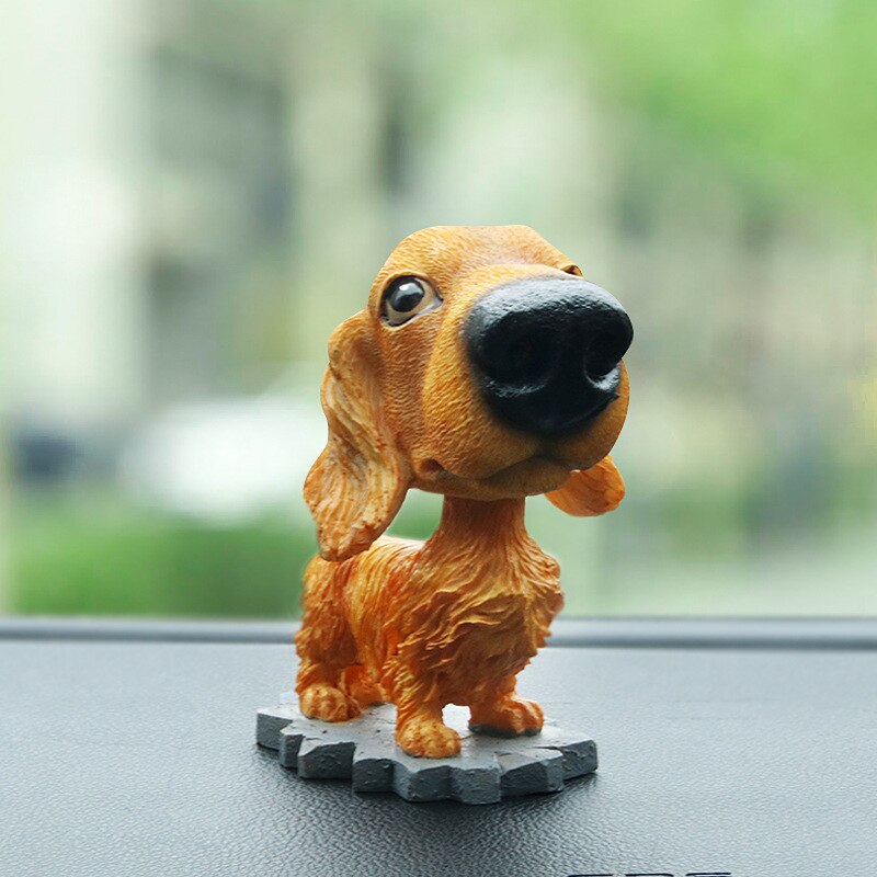 Model hars beroemde hond decoratie draaiende puppy hond decoratie auto huisdecoratie autodecoratie r -8806: 1 teckel 1 st