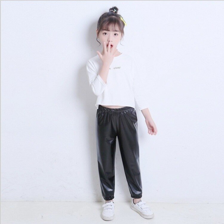 Pantaloni per ragazze in PU pantaloni larghi autunnali primaverili per bambini pantaloni per bambini elastici Casual pantaloni per adolescenti in pelle Leggings per bambini
