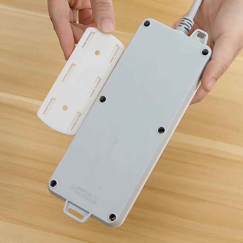 Power Strip Holder Desk Organiser wall-mounted Strong Seamless Home Free Punching Socket Hanging Wall Home Storage Supplies