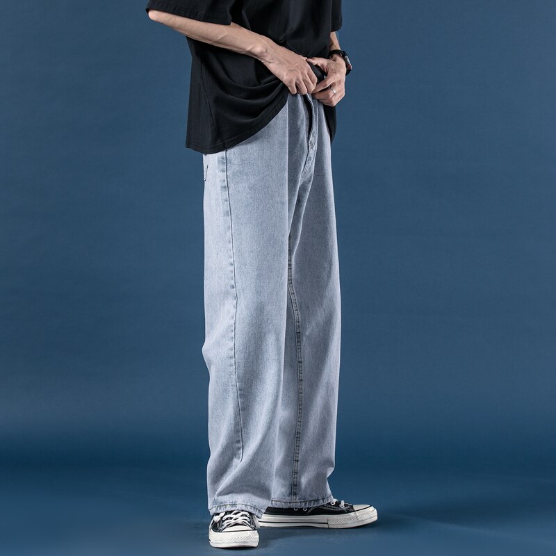 Lyse jeans herre efterår lige løse herrebukser koreansk stil trendy brede ben mopping daddy bukser: Lyseblå / Xl  65-73( kg)