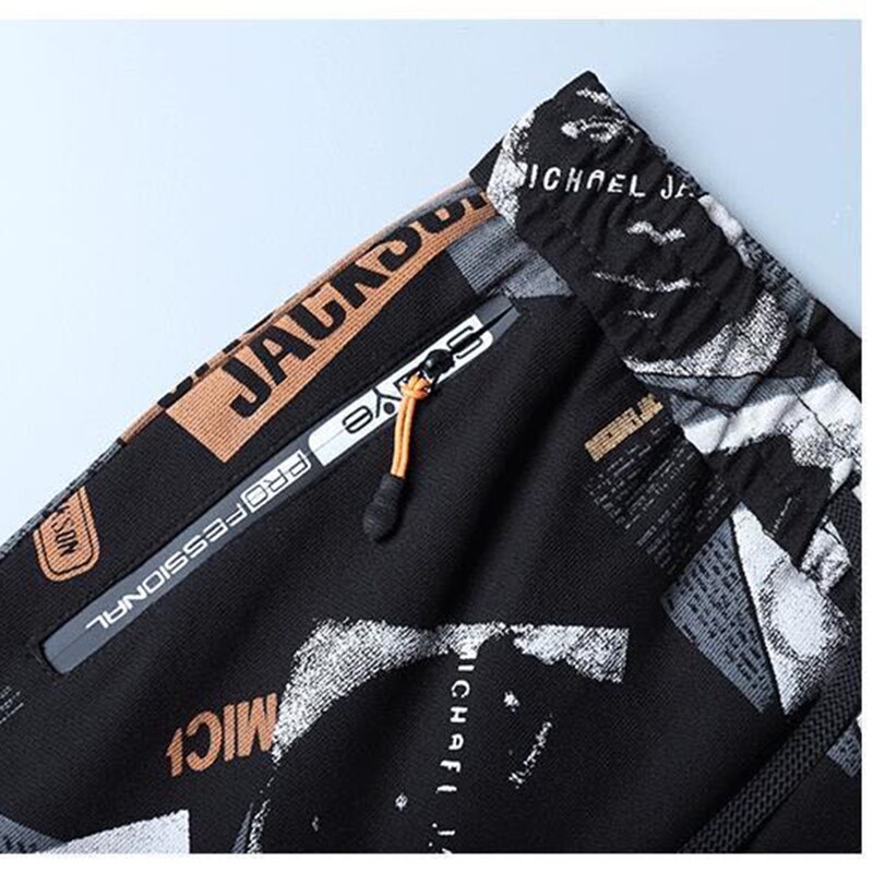 Pantalones deportivos de gama alta para hombre, pantalón informal con estampado de pies, sección gruesa, temporada otoño e invierno, novedad