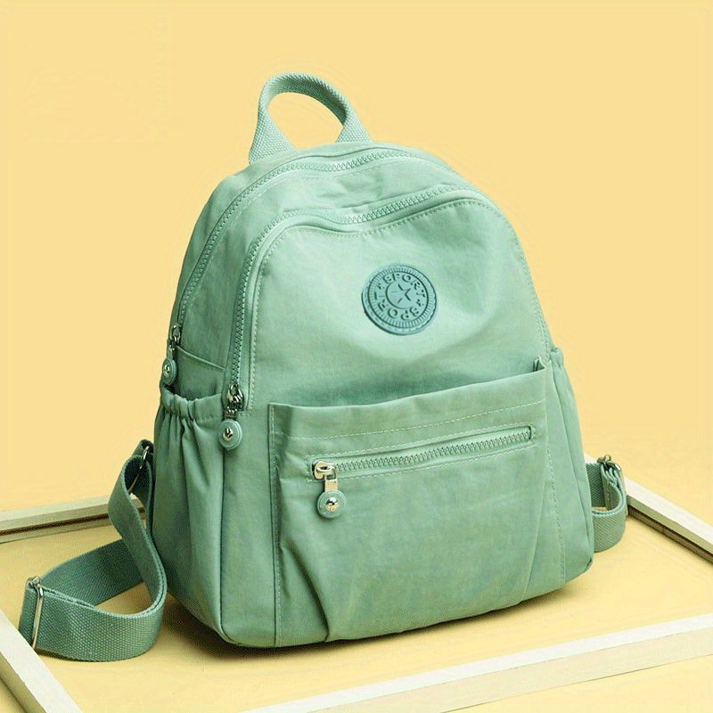 Mochila de nylon de cor sólida, bolsa escolar de viagem leve, mochila moderna para trabalho, bolsa de viagem pode ser pendurada em bagagem: CÉU AZUL