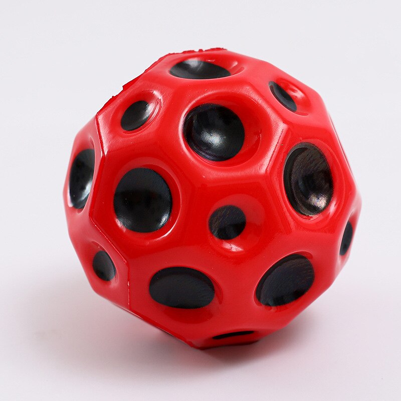 6cm mini högelastisk solid pu skum fotboll träning hål boll för att lindra stress fidget leksak elastisk boll moon ball för barn: Röd