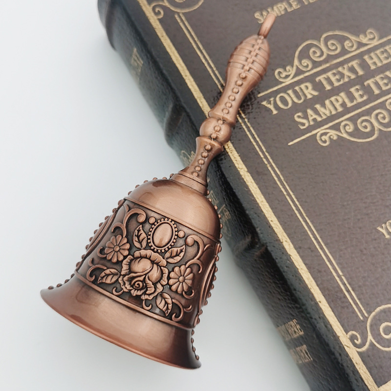 Moderne klar lyd håndklokke bronze metal retro rose kirkeklokke gylden middagsklokke til restaurant bar jingle kirke skole: Lysegrøn