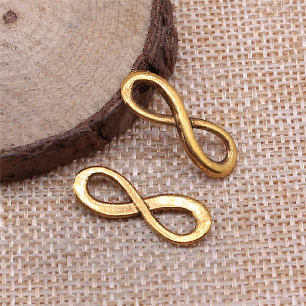 WYSIWYG 30pz 23x8mm infinito Fascino del Connettore 4 Colori infinito simbolo Connettori Produzione di Gioielli FAI DA TE Fatti A Mano Del Mestiere: Oro antico placcato