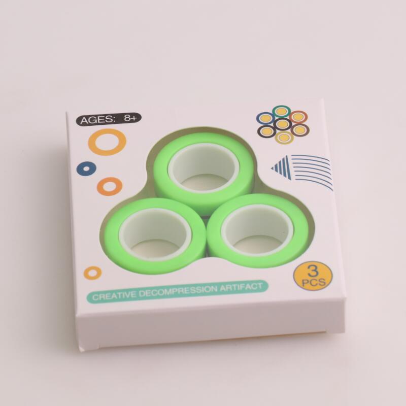 Anti-stress magnetiska magiska ringar packa upp leksaker för magiker trick rekvisita dekomprimering magiska trick små ornament: Grön
