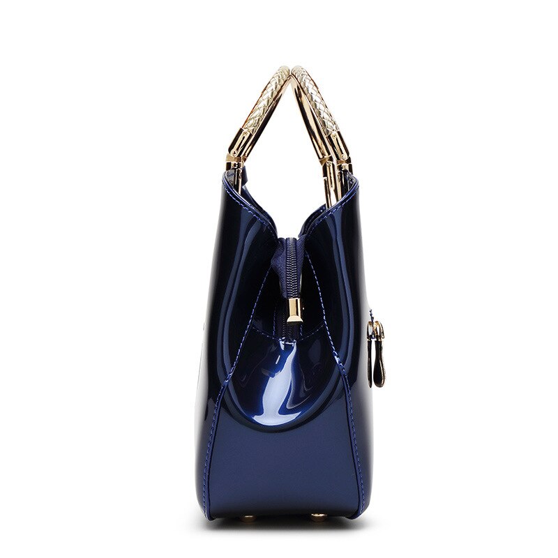 Saco de concha das mulheres 2019 nova moda europeia e americana couro patente um ombro saco do mensageiro textura rosto brilhante bolsa