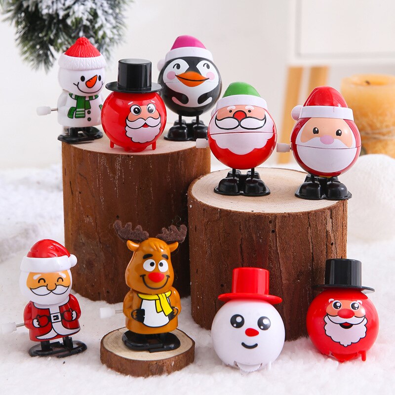 Muchos tipos de Papá Noel, muñeco de nieve, pingüino, juguetes clásicos de cuerda, juguetes de cuerda de navidad, para niños