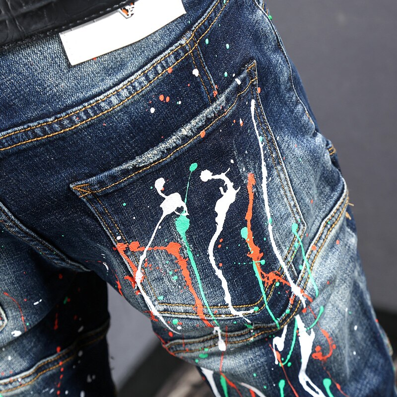Streetwear mænd jeans spliced slim fit ripped biker jeans homme paint elastisk hip hop lange bukser