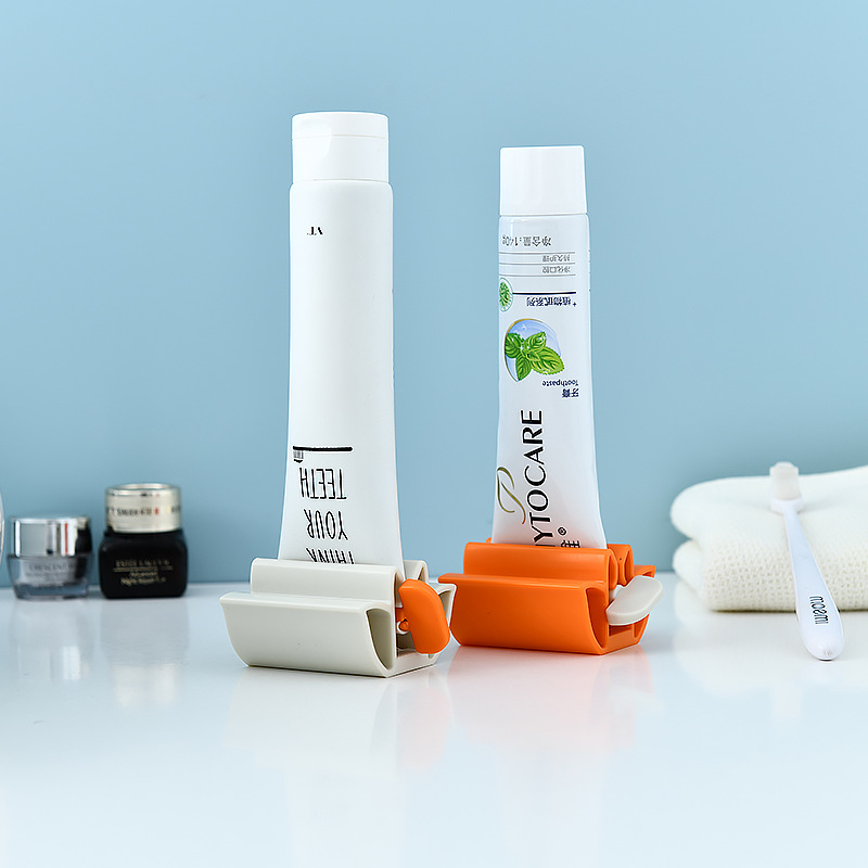 tandpasta knijper tube uitknijper toothpaste squeezer badkamer accessoires tandpasta dis Rolling Tandpasta Apparaat Buis Dispenser Houder Multifunctionele Plastic Gezichtsreiniger Knijper Pers Voor Badkamer Accessoires