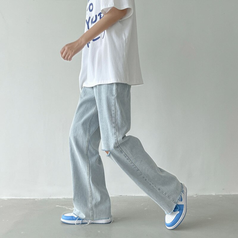 Letnie jeansy szerokie nogawki męskie modne oświetlenie niebieskie dorywczo porwane jeansy męskie Streetwear luźne spodnie biodro-hopowe proste spodnie jeansowe męskie: M