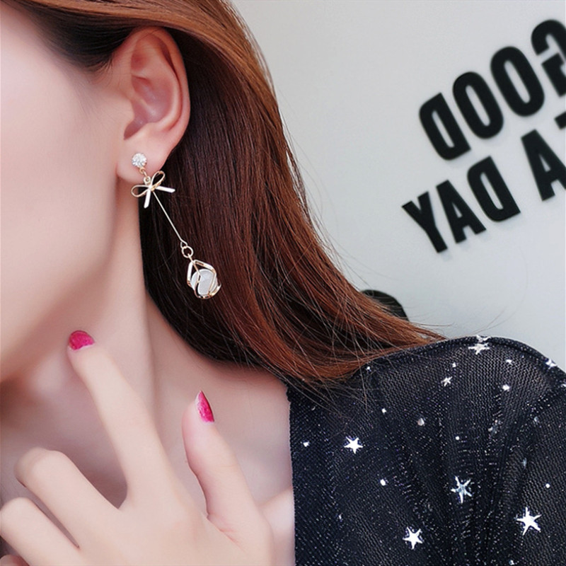 Trendy oorbellen met metalen frame en hangende opalen voor dames, gouden strass-steentjes, strikjes, lange sieraden voor bruiloften en feestjes.