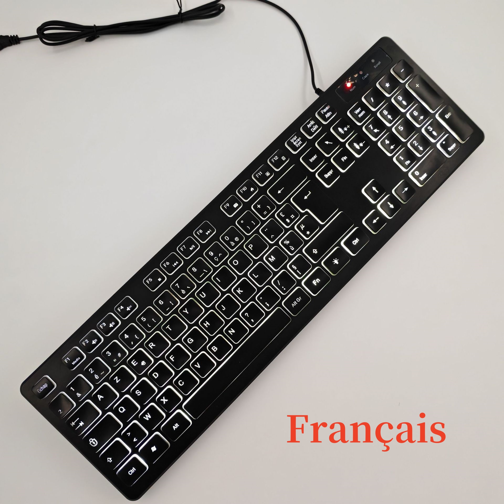 Teclado en español con la Ñ Teclado ruso, árabe, francés, alemán, inglés Ratón 100 % Retroiluminación arcoíris Letras translúcidas ISO 105 teclas Teclas de acceso directo multimedia W66