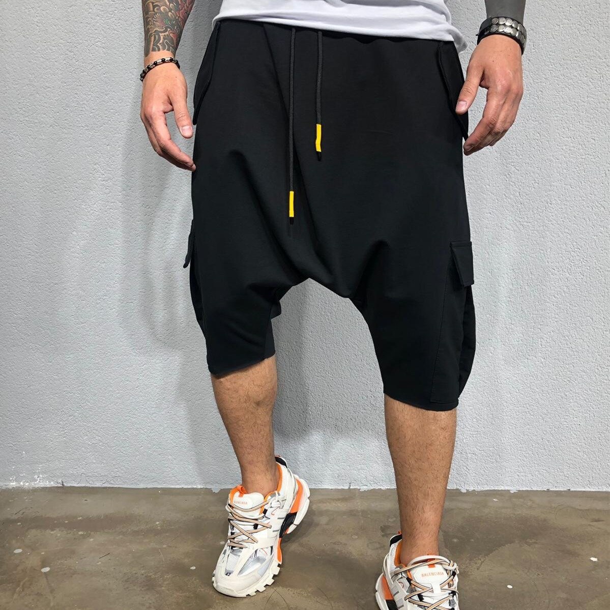 Calça masculina folgada, nova moda hip-hop, calça estilo europeu e americano, cor sólida, esportiva casual, com corte de harlan: L / black