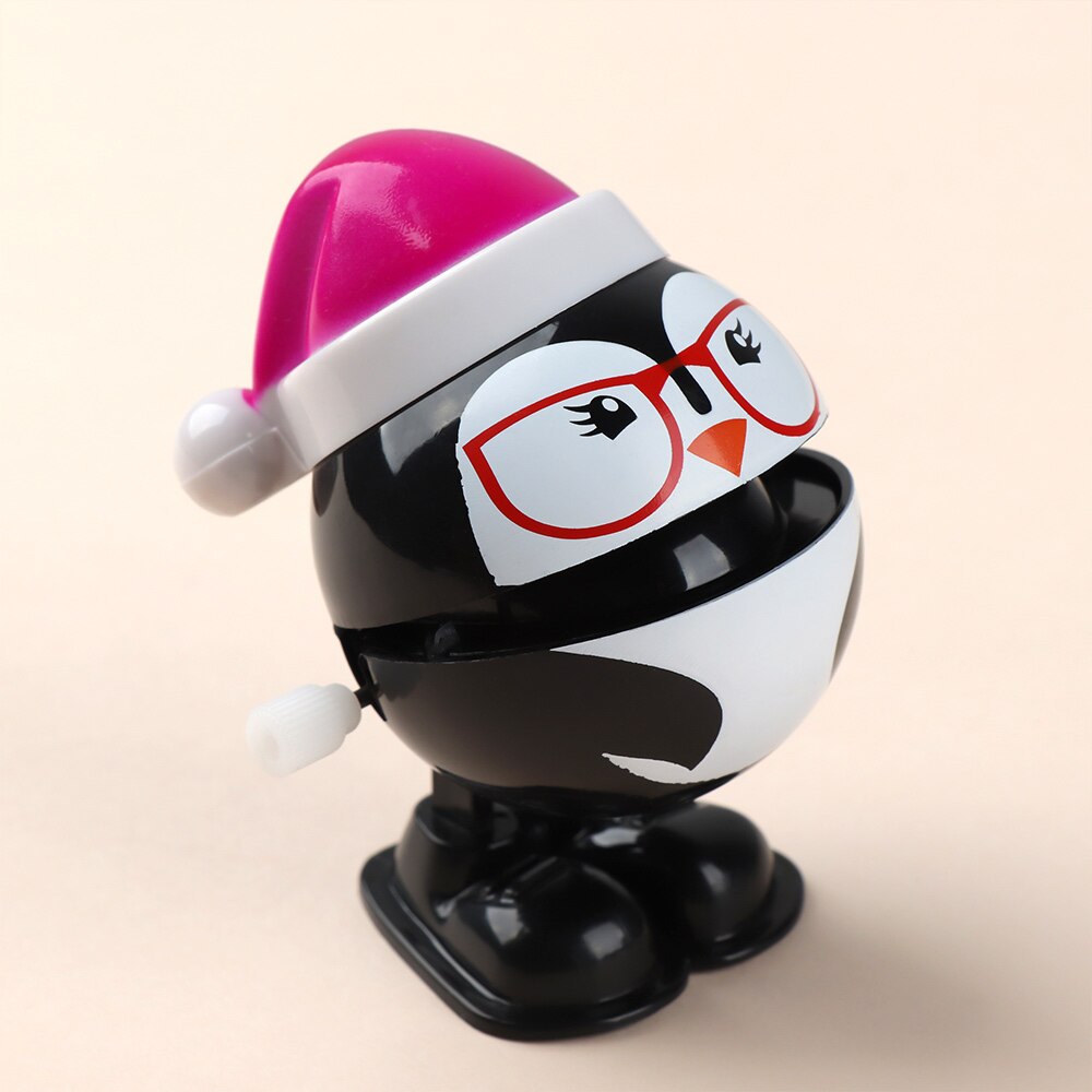 1 PC Leuke Kleurrijke Cap Plastic Mini Kerst Kerstman Classic Wind Up Speelgoed Sneeuwpop Pinguïn Clockwork Speelgoed: purple