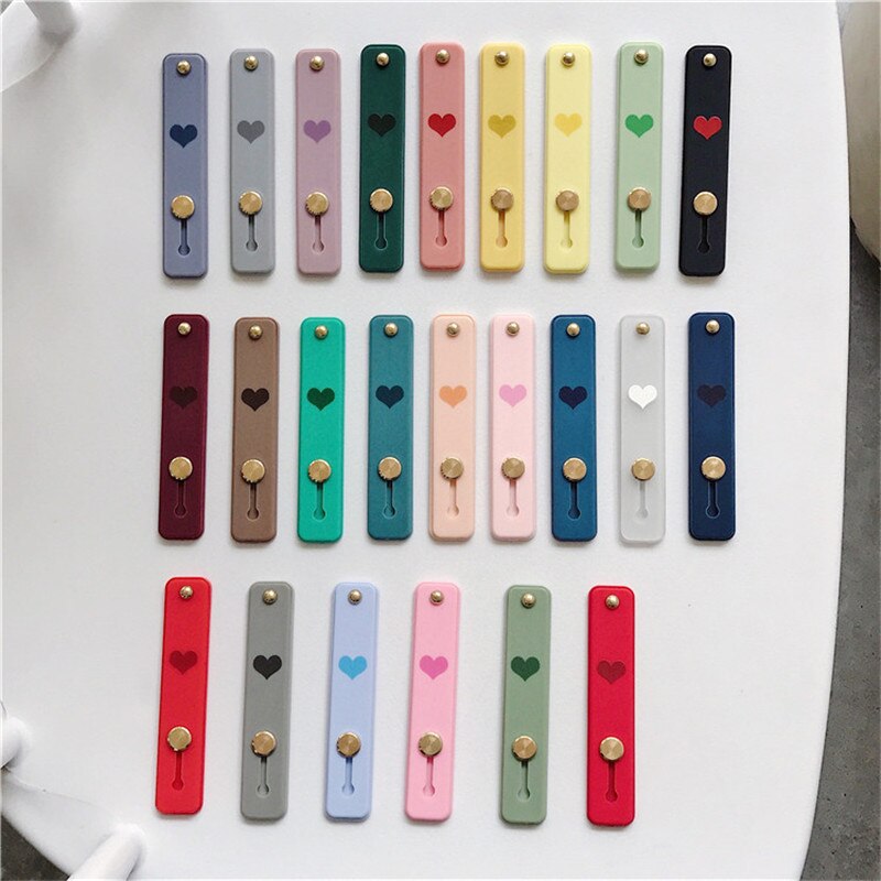 1 pz Candy color cuore custodia per cellulare staffa supporto per cinturino da polso push stretch cinturino da polso in silicone supporto per impugnatura per dito