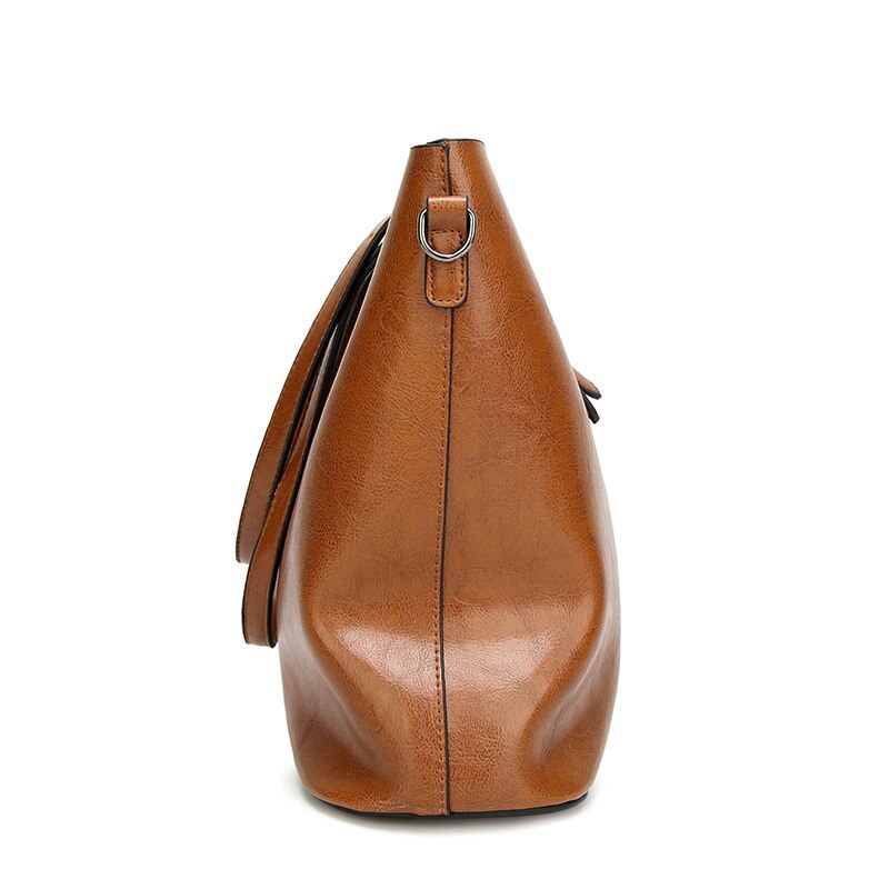 Bolso de hombro de cuero de estilo Retro, bolso sencillo con borla, bolso portátil de tendencia, bolso de lujo para mujer, bolso informal para mujer