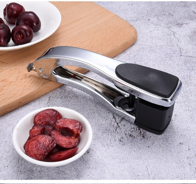 1 pieza de picadora de cereza de acero inoxidable, fácil dátil rojo, semillas de aceitunas, removedor de Corer, triturador de piedras para exprimir, utensilios de cocina QA 090
