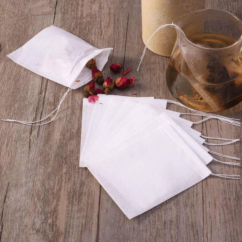 Ounona 200 pces drawstring saco de chá filtro de papel vazio saquinho de chá sacos para folhas soltas chá em pó ervas (branco)