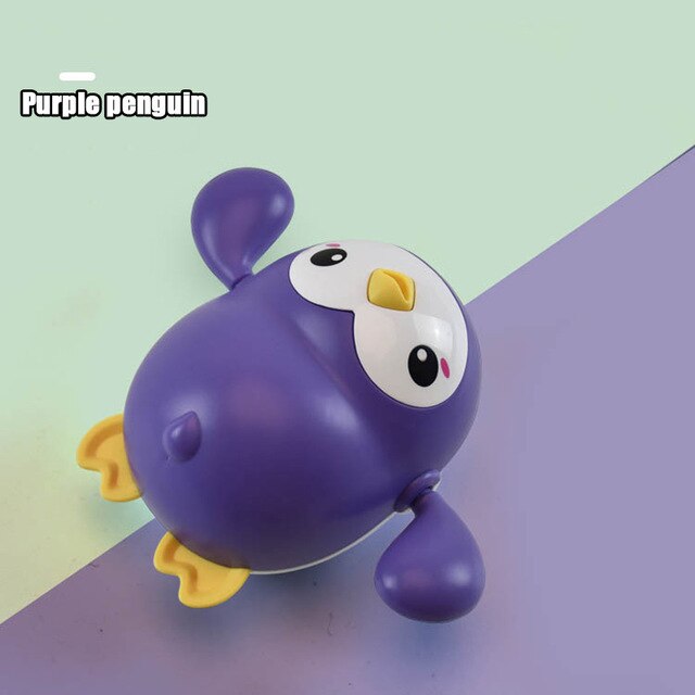 1pcs Del Bambino Acqua Giocattoli Da Bagno Anatre Animale Del Fumetto Catena di Orologeria Granchio Pinguino Balena Piscina Piscina di Balneazione Giocattoli Per I Bambini regalo: Purple Penguin