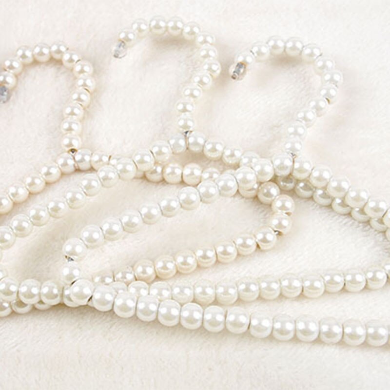 Pack de 3 perchas elegantes de plástico con perlas blancas a la para niños y mascotas.