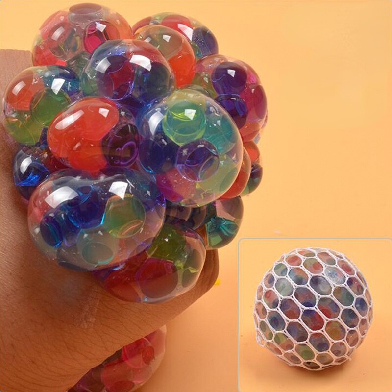 Stressavlastning presse drueballer avlaste trykkballer håndfidget leketøy regnbue nyskapende klemme ball mesh squishy baller: 5cm fargede perler