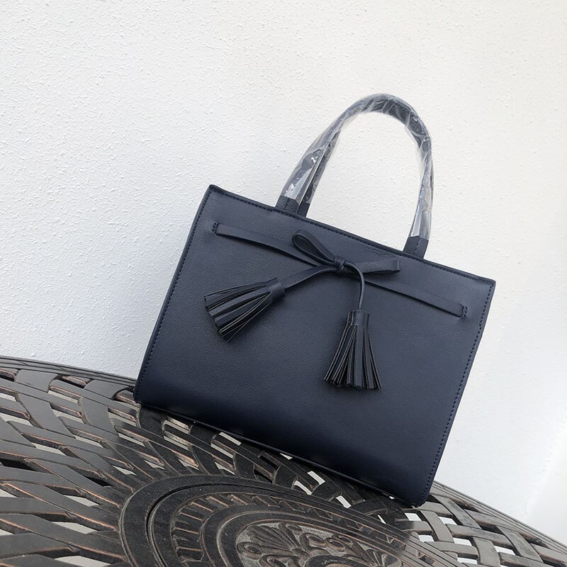 Gaohe europeu e americano bolsa de comércio exterior bolsa feminina outono e inverno nova fronteira bolsa borla arco pequeno quadrado ba
