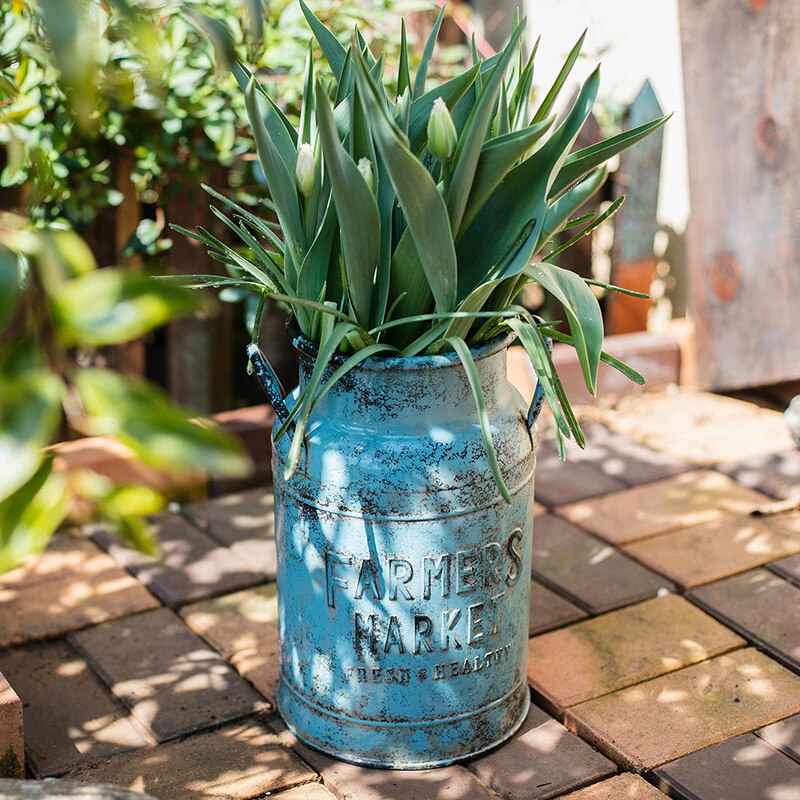 rustic blue metal milk can flower arrangements