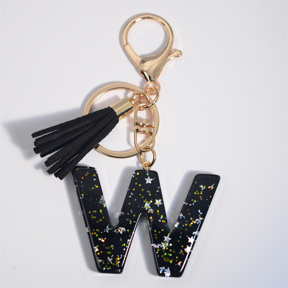 Schwarze Initialen A-Z Schlüsselanhänger Glitzer Stern Pailletten Harz Buchstaben Schlüsselanhänger mit Quaste für Frauen Tasche Ornamente Charm Autoschlüsselhalter