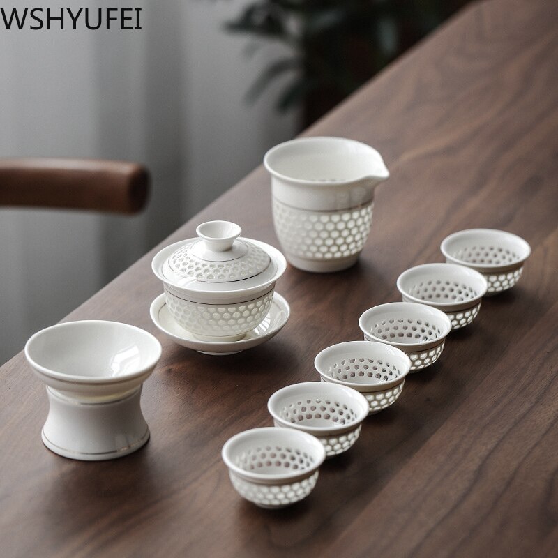 A set of white porcelain Tea set tea set home hollow hollow cellling tea set a whole set of household ceramic tea set