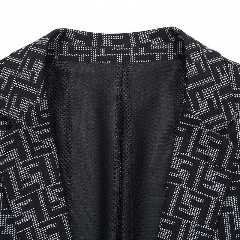 Stoere knappe pakjas heren dunne lente en herfst single west-koreaanse vrijetijdstrend persoonlijkheid knap geruit pak