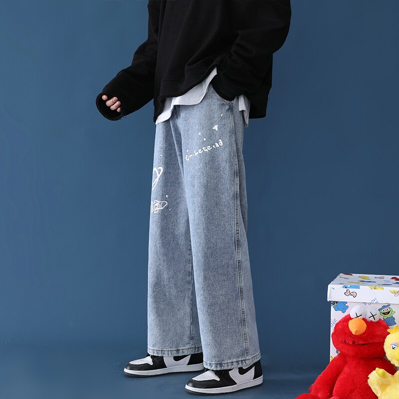 Pantalones vaqueros con Graffiti hombre recto skateboard chic suelto sal serie versátil ancho de la pierna de papá de venta al por menor ropa informal estilo hip hop