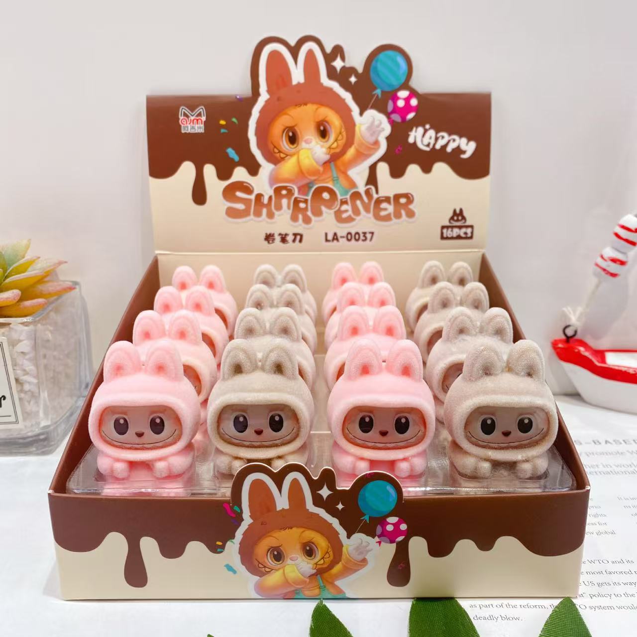 Cute Cartoon doll pencil sharpener Portable manual pencil sharpener with 3D soft rubber shape student stationery prize: Brown