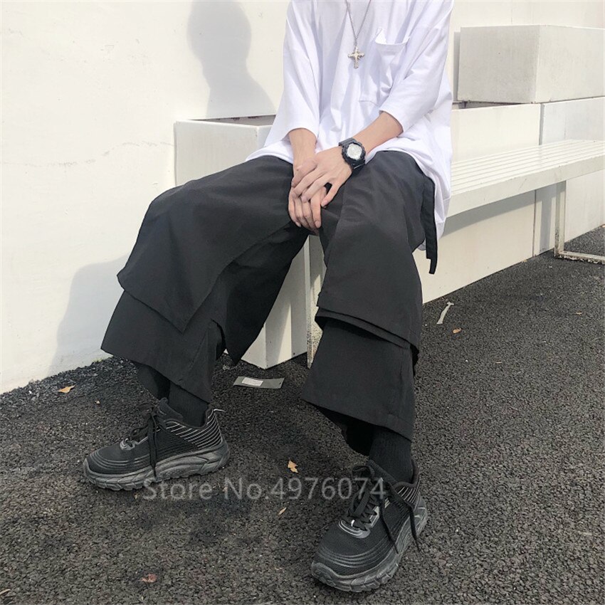 Pantalones de pierna ancha de estilo japonés para hombre, Pantalón recto Irregular, Harajuku, negro, ropa de samurái, Unisex, estilo Hip Hop urbano
