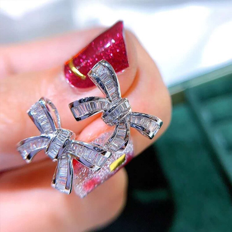 Neue Bogen Knoten Silber Farbe Ohrring Halskette Ring einstellen Bling Zirkon Stein Braut Schmuck Damen Partei Schmuck setzt